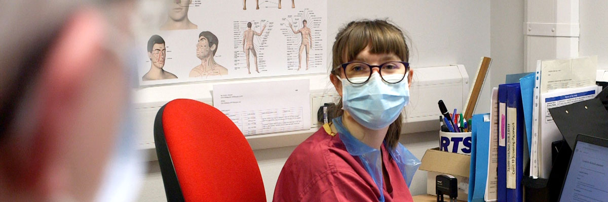 Patient speaking to a member of staff