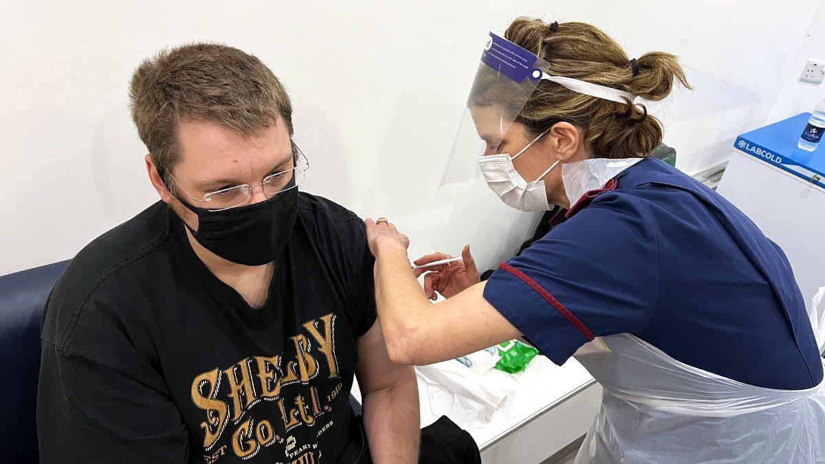 Member of the publis being vaccinated at University Hospitals Birmingham NHS Foundation Trust