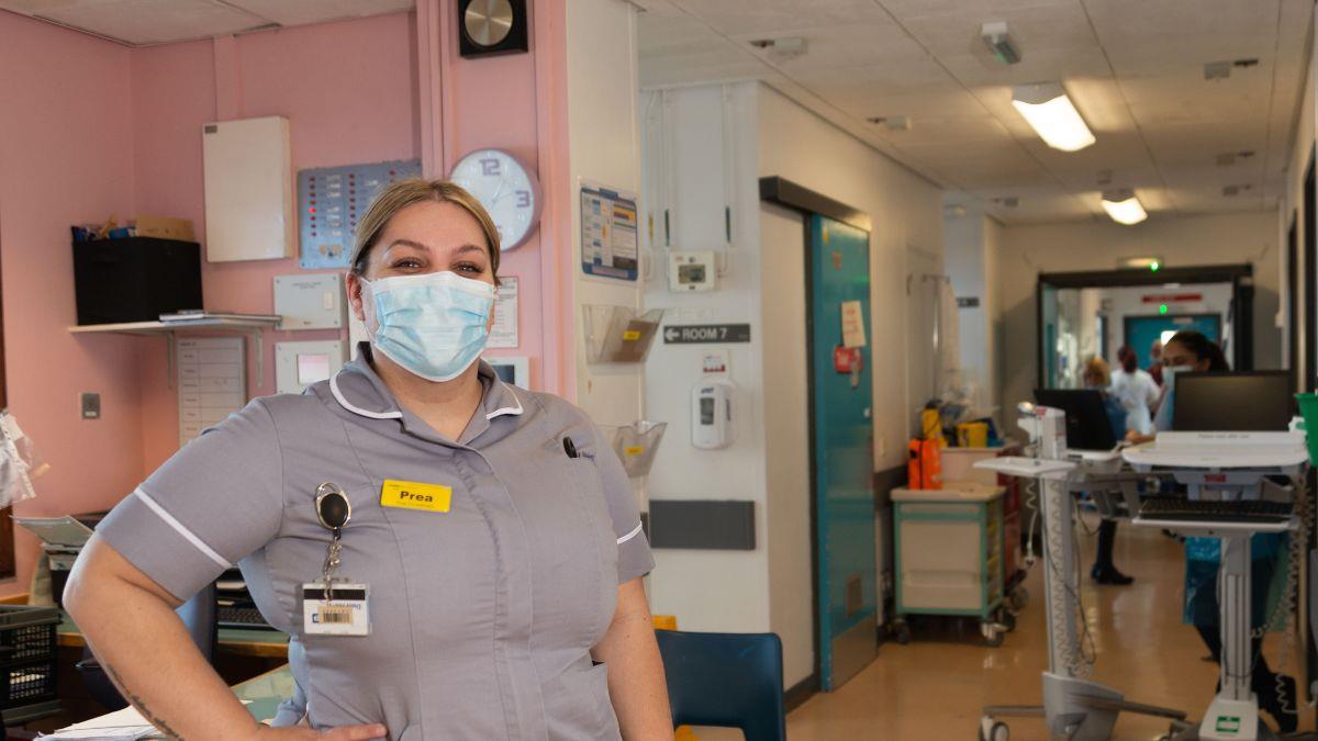 Member of UHB staff wearing a mask